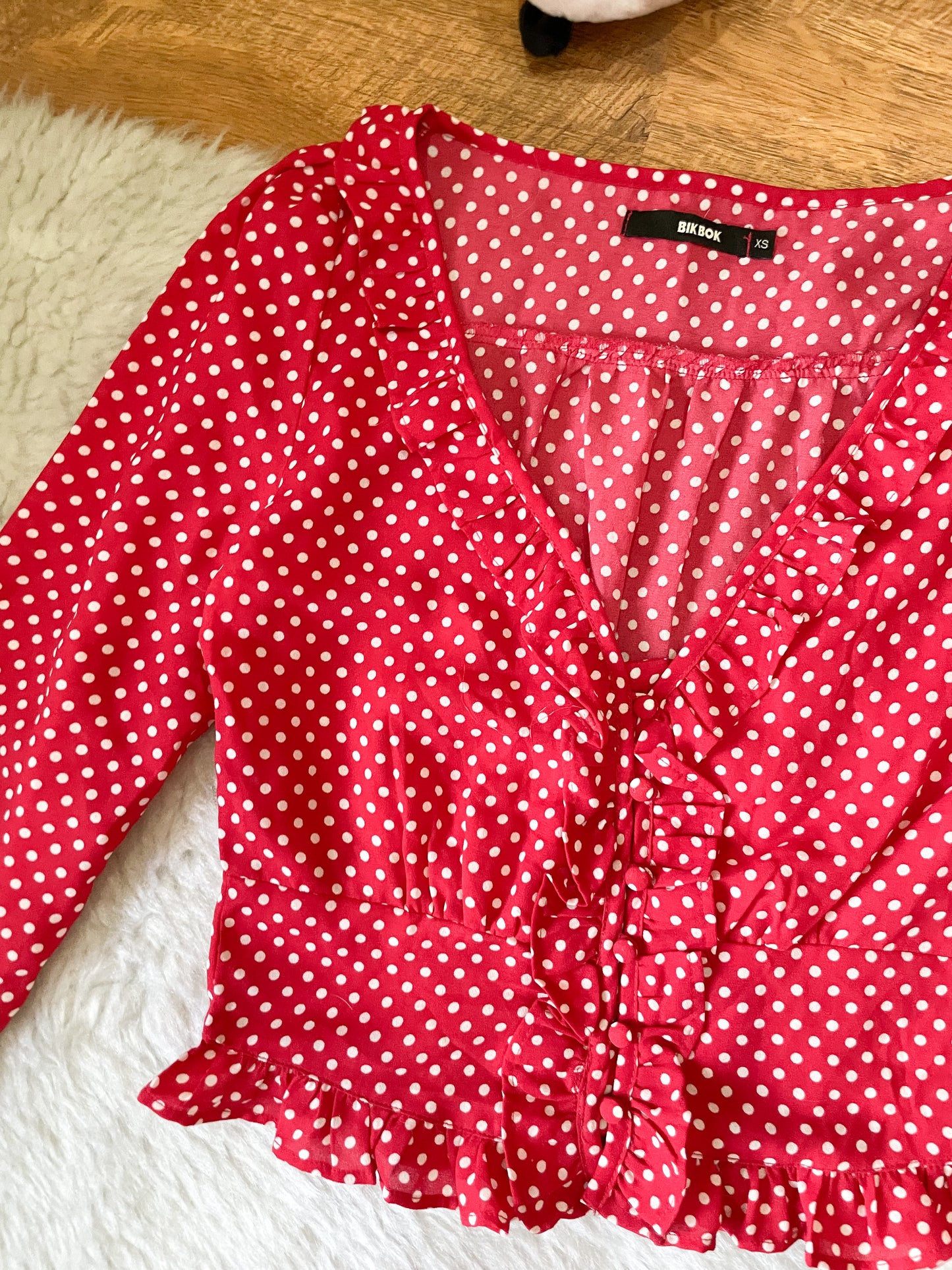 red polka dot top