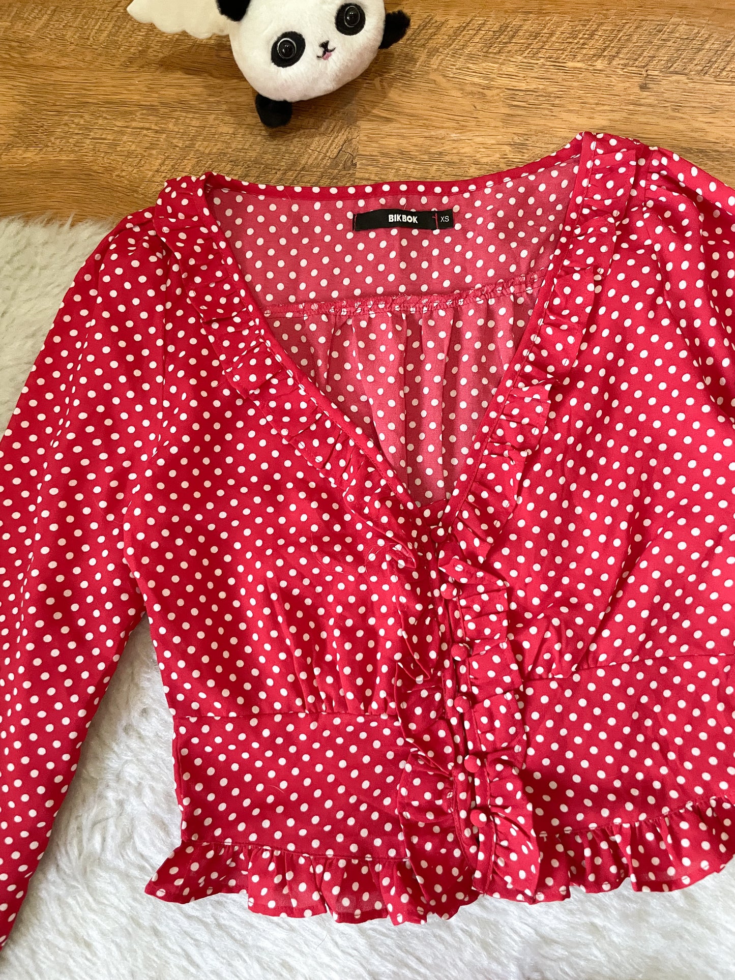red polka dot top