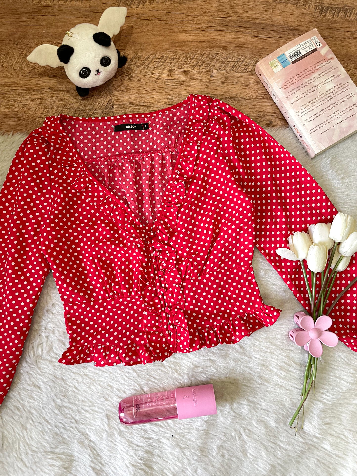 red polka dot top